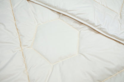 Steppbett Tussah-Wildseide – edles Naturprodukt mit kbA-Baumwollbezug, auf Bestellung gefertigt | KLEINER Naturbettwaren