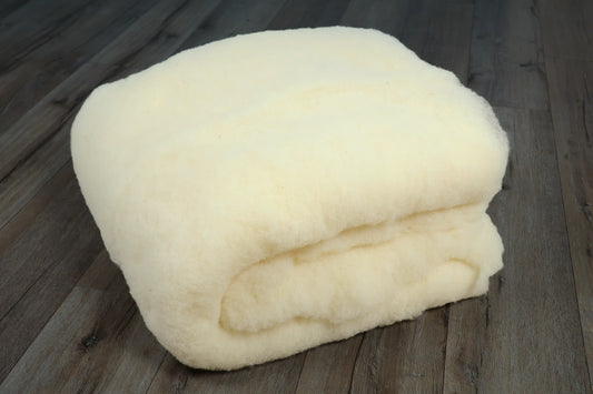 Kopfkissen-Füllung Merinowolle kbT im Vlies, 1 kg – KLEINER Naturbettwaren